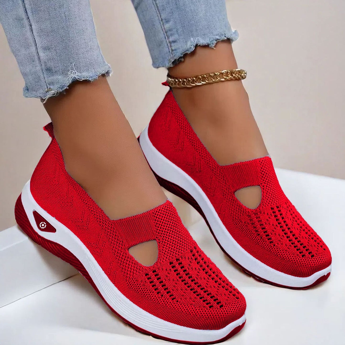 Red slip-on shoes with cut-out design